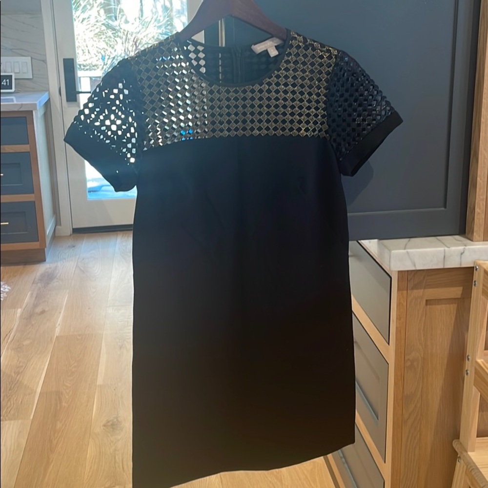 Black shift dress with metallic and mesh detail - great for holiday parties!